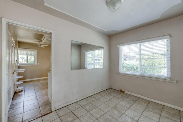 724 W Harvard Ave, Fresno, CA 93705 - empty room with light tile patterned flooring, baseboards, and ceiling fan