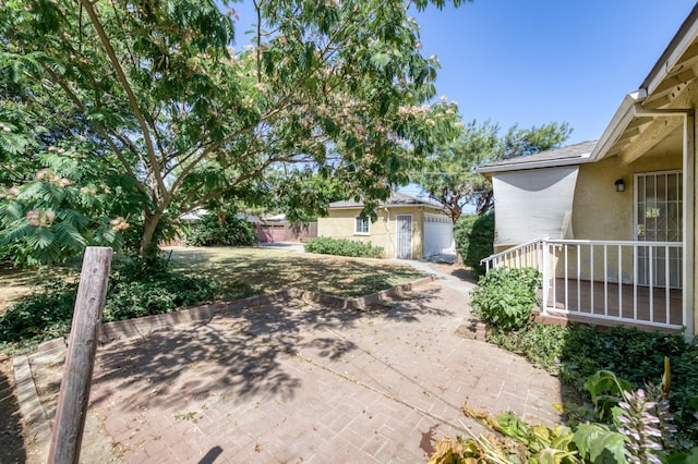 724 W Harvard Ave, Fresno, CA 93705 - view of yard with a patio and an outdoor structure