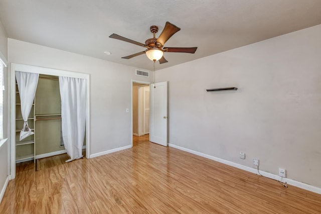 724 W Harvard Ave, Fresno, CA 93705 - unfurnished bedroom with light wood-style flooring, a closet, and baseboards
