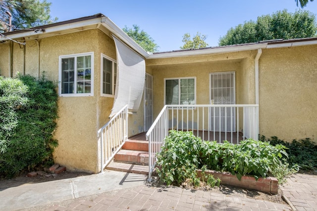 724 W Harvard Ave, Fresno, CA 93705 - property entrance featuring stucco siding