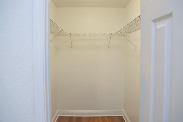 2881 E Huntington Blvd Unit 230, Fresno, CA 93721 - spacious closet featuring wood finished floors