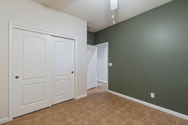 2841 E Brandon Ln, Fresno, CA 93720 - unfurnished bedroom featuring a closet and baseboards