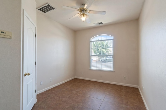 2841 E Brandon Ln, Fresno, CA 93720 - unfurnished room with ceiling fan, tile patterned floors, and baseboards