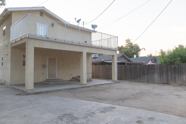 2048 N Arthur Ave, Fresno, CA 93705 - back of house featuring stucco siding