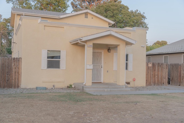 2048 N Arthur Ave, Fresno, CA 93705 - view of front facade featuring stucco siding