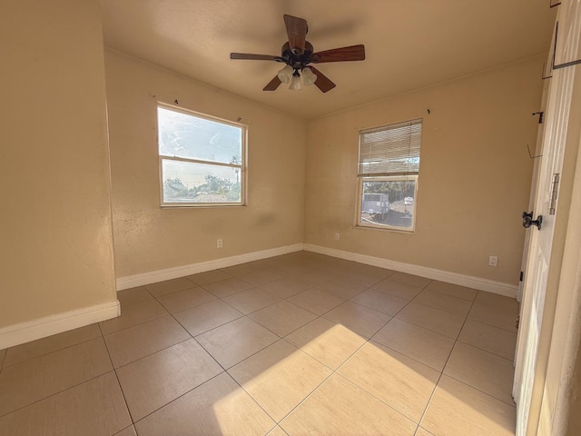 2048 N Arthur Ave, Fresno, CA 93705 - tiled empty room with a ceiling fan and baseboards