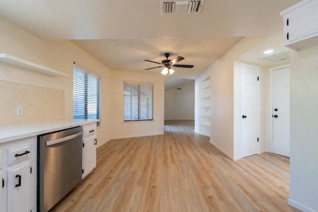 1707 Douglas Ave, Clovis, CA 93611 - kitchen featuring dishwasher, light wood-style floors, white cabinets, and light countertops