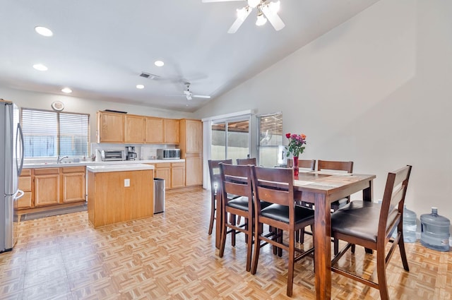 5572 W Indianapolis Ave, Fresno, CA 93722 - dining area with a ceiling fan, lofted ceiling, and recessed lighting