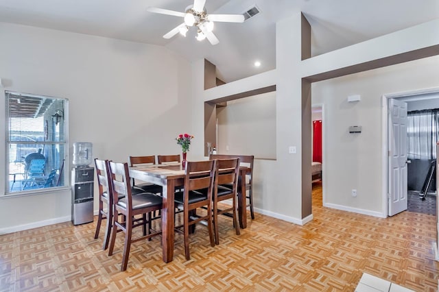5572 W Indianapolis Ave, Fresno, CA 93722 - dining area with baseboards, a ceiling fan, and high vaulted ceiling
