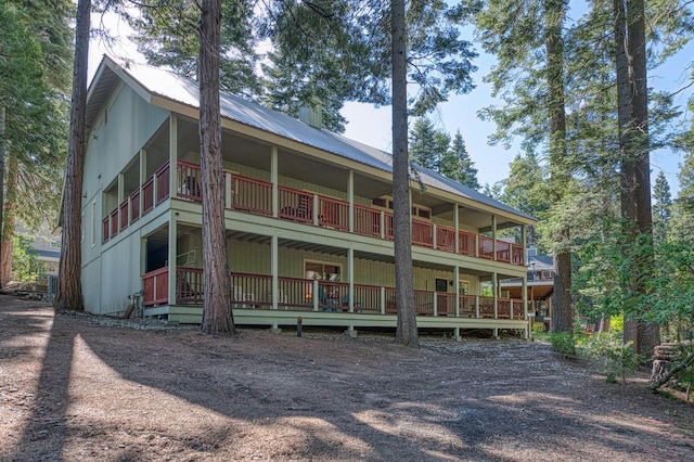 41228 Heartwood Ln, Shaver Lake, CA 93664 - back of property featuring metal roof and a chimney