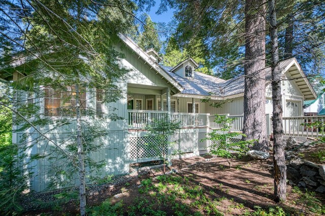 41228 Heartwood Ln, Shaver Lake, CA 93664 - view of home's exterior with covered porch and an attached garage