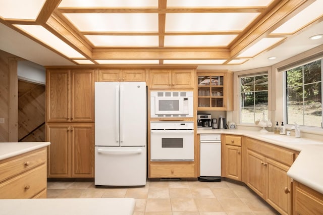 41035 Cold Springs Ln, Shaver Lake, CA 93664 - kitchen with white appliances, light tile patterned floors, light countertops, glass insert cabinets, and a sink