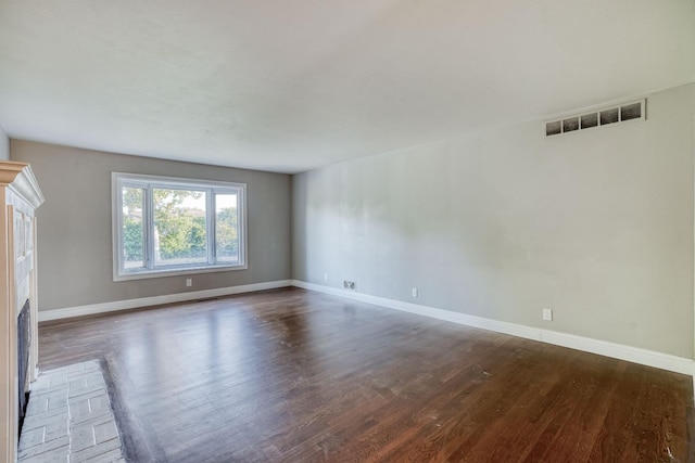 1463 W San Madele Ave, Fresno, CA 93711 - unfurnished living room featuring wood finished floors and baseboards