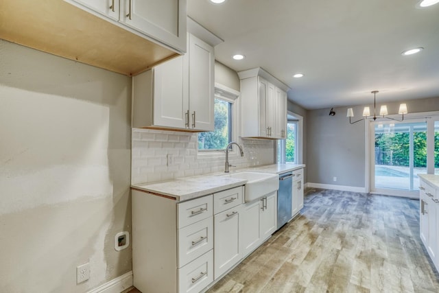 1463 W San Madele Ave, Fresno, CA 93711 - kitchen featuring baseboards, stainless steel dishwasher, a sink, plenty of natural light, and recessed lighting