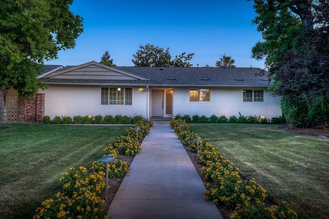 1463 W San Madele Ave, Fresno, CA 93711 - single story home with stucco siding, a front yard, and roof with shingles