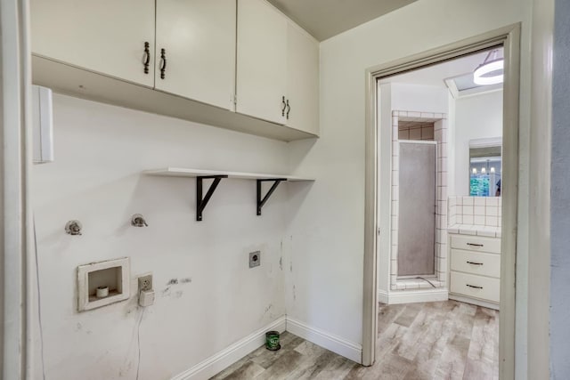 1463 W San Madele Ave, Fresno, CA 93711 - washroom with electric dryer hookup, light wood-style flooring, cabinet space, gas dryer hookup, and washer hookup