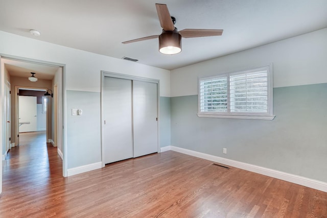 1463 W San Madele Ave, Fresno, CA 93711 - unfurnished bedroom with light wood-style floors, baseboards, a closet, and ceiling fan