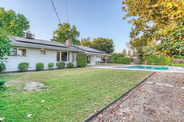 1463 W San Madele Ave, Fresno, CA 93711 - view of yard featuring a patio and central AC