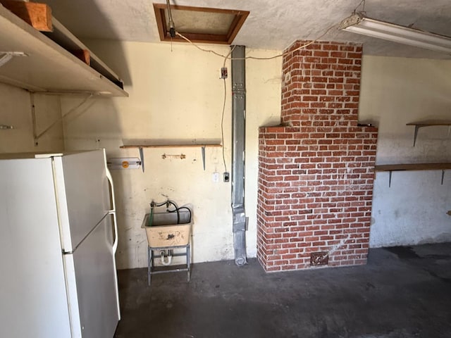 2314 E Cornell Ave, Fresno, CA 93703 - garage with freestanding refrigerator and a sink