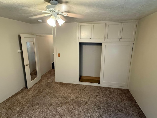 2314 E Cornell Ave, Fresno, CA 93703 - unfurnished bedroom featuring carpet, a ceiling fan, a closet, and a textured ceiling