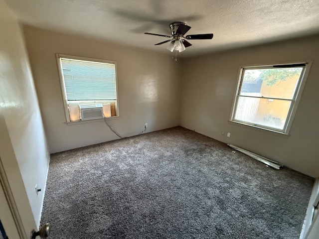 2314 E Cornell Ave, Fresno, CA 93703 - empty room featuring carpet floors, cooling unit, ceiling fan, and a baseboard radiator