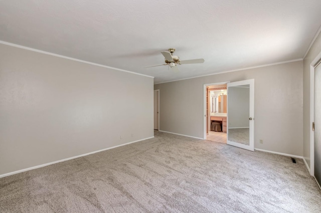 1463 W Browning Ave, Fresno, CA 93711 - empty room with light colored carpet, a ceiling fan, and crown molding