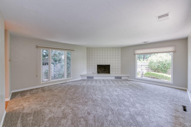 1463 W Browning Ave, Fresno, CA 93711 - unfurnished living room with baseboards, plenty of natural light, and carpet