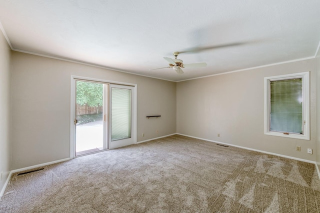 1463 W Browning Ave, Fresno, CA 93711 - carpeted empty room with ceiling fan, crown molding, and baseboards