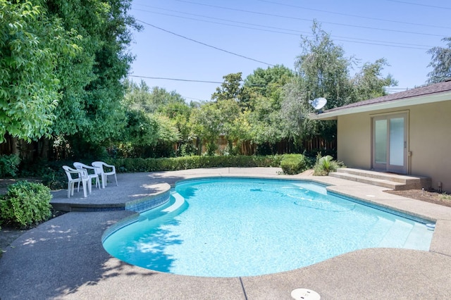 1463 W Browning Ave, Fresno, CA 93711 - view of swimming pool featuring a patio and a fenced backyard