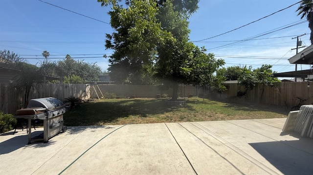 2326 E Clay Ave, Fresno, CA 93701 - fenced backyard with a patio and a grill