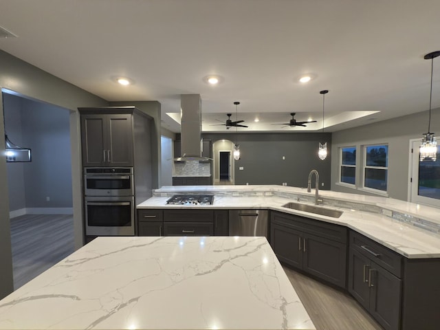 21275 Rd 28 Unit 1 2, Madera, CA 93638 - kitchen featuring a sink, island exhaust hood, stainless steel appliances, ceiling fan, and light stone counters