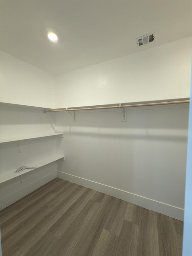 21275 Rd 28 Unit 1 2, Madera, CA 93638 - walk in closet with dark wood-style floors
