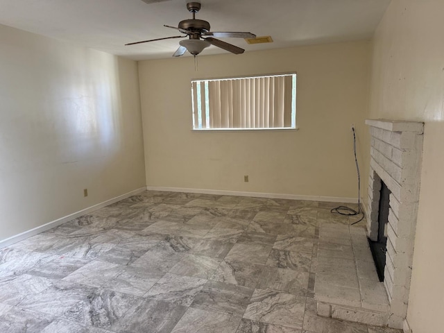 336 Walnut Ave, Coalinga, CA 93210 - unfurnished living room with ceiling fan, a brick fireplace, and baseboards