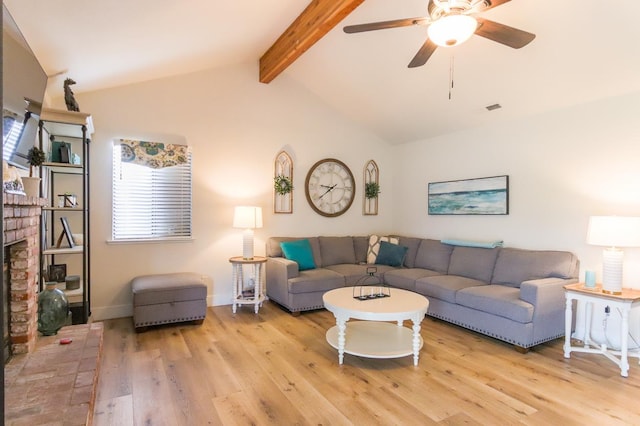 36140 Blanca Ave, Madera, CA 93636 - living area featuring light wood finished floors, plenty of natural light, a ceiling fan, and a fireplace