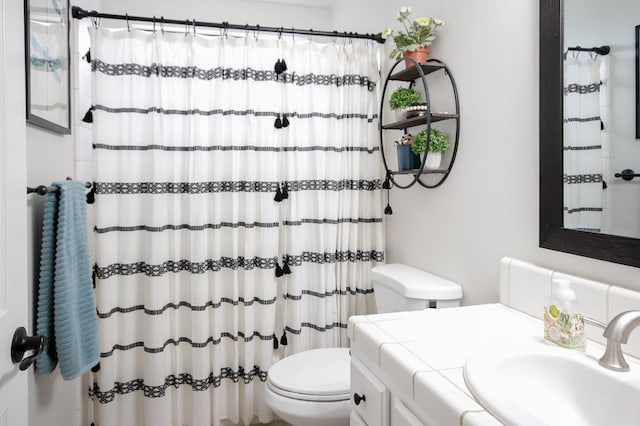 36140 Blanca Ave, Madera, CA 93636 - full bathroom featuring toilet, vanity, and a shower with curtain