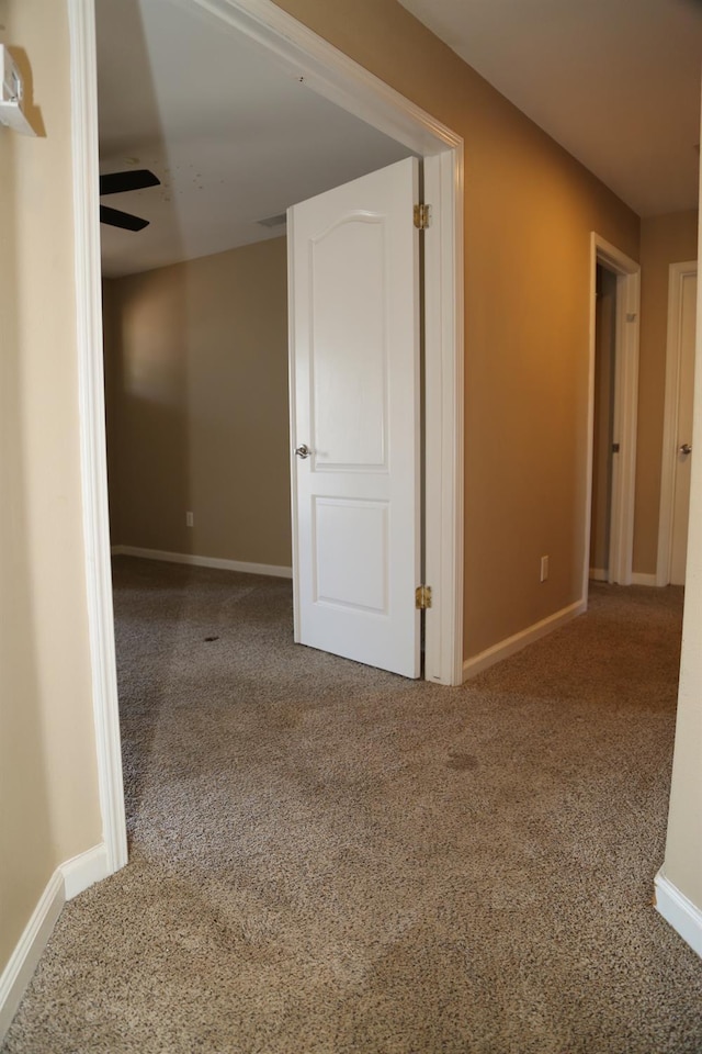 5811 W Cromwell Ave, Fresno, CA 93722 - spare room with carpet, baseboards, and ceiling fan