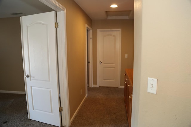 5811 W Cromwell Ave, Fresno, CA 93722 - hall with dark carpet, baseboards, and recessed lighting