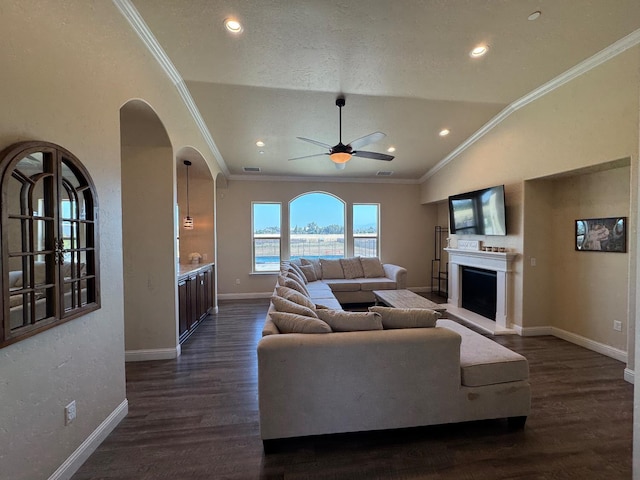 13390 E Falcon Mdw, Clovis, CA 93619 - living area with ceiling fan, crown molding, dark wood finished floors, lofted ceiling, and baseboards