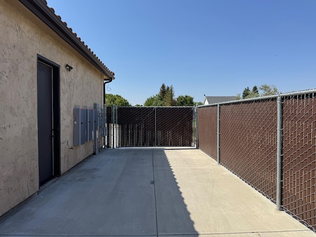 13390 E Falcon Mdw, Clovis, CA 93619 - view of patio / terrace featuring a gate