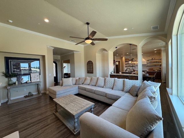 13390 E Falcon Mdw, Clovis, CA 93619 - living room featuring dark wood-style flooring, ceiling fan, recessed lighting, baseboards, and ornamental molding