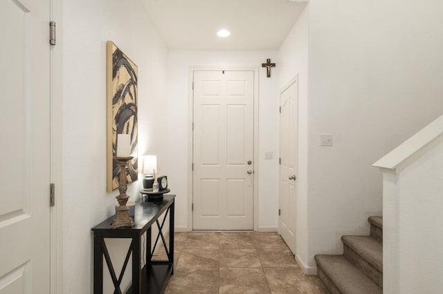 7452 E Giavanna Ave, Fresno, CA 93737 - foyer entrance featuring stairway, baseboards, and recessed lighting