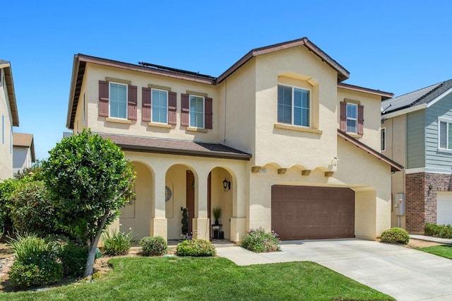 7452 E Giavanna Ave, Fresno, CA 93737 - traditional-style house with a garage, stucco siding, driveway, and a front yard
