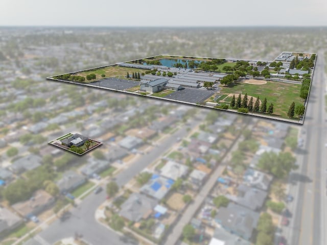 3926 N Kavanagh Ave, Fresno, CA 93705 - aerial view of property and surrounding area featuring property parcel outlined