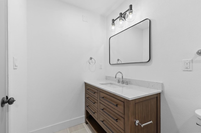 3926 N Kavanagh Ave, Fresno, CA 93705 - bathroom with vanity and baseboards