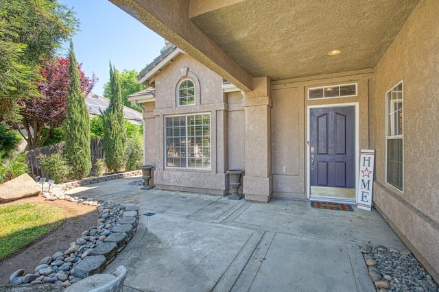 1039 N Burgan Ave, Clovis, CA 93611 - entrance to property featuring stucco siding and a patio