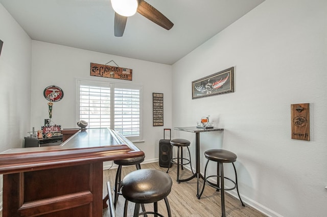 1039 N Burgan Ave, Clovis, CA 93611 - bar featuring light wood-type flooring, baseboards, and ceiling fan