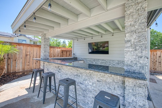 1039 N Burgan Ave, Clovis, CA 93611 - fenced backyard with a patio area