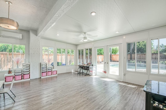 1039 N Burgan Ave, Clovis, CA 93611 - sunroom / solarium with french doors, a wall mounted air conditioner, and plenty of natural light