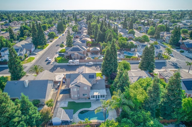 1039 N Burgan Ave, Clovis, CA 93611 - aerial view of property's location featuring nearby suburban area and a pool area