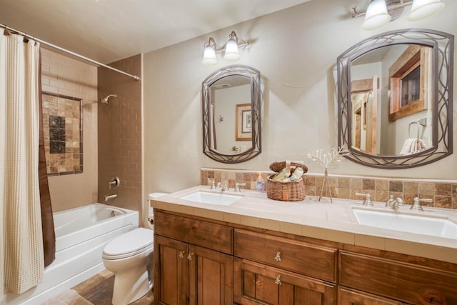 39516 Littleridge Rd, Shaver Lake, CA 93664 - full bathroom featuring shower / bath combo with shower curtain, double vanity, and toilet